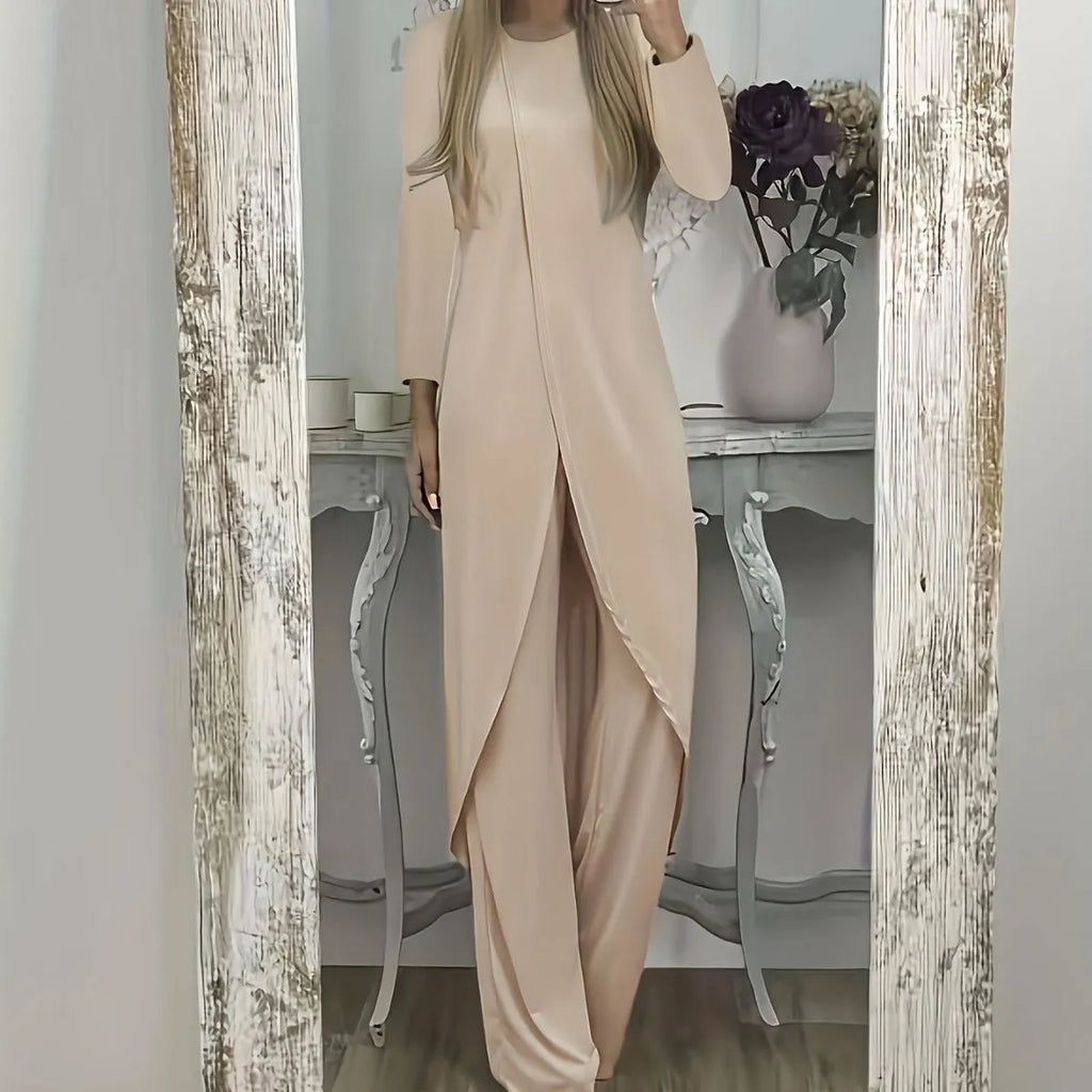 Casual long sleeve top and trousers lounge set in black, shown on a hanger