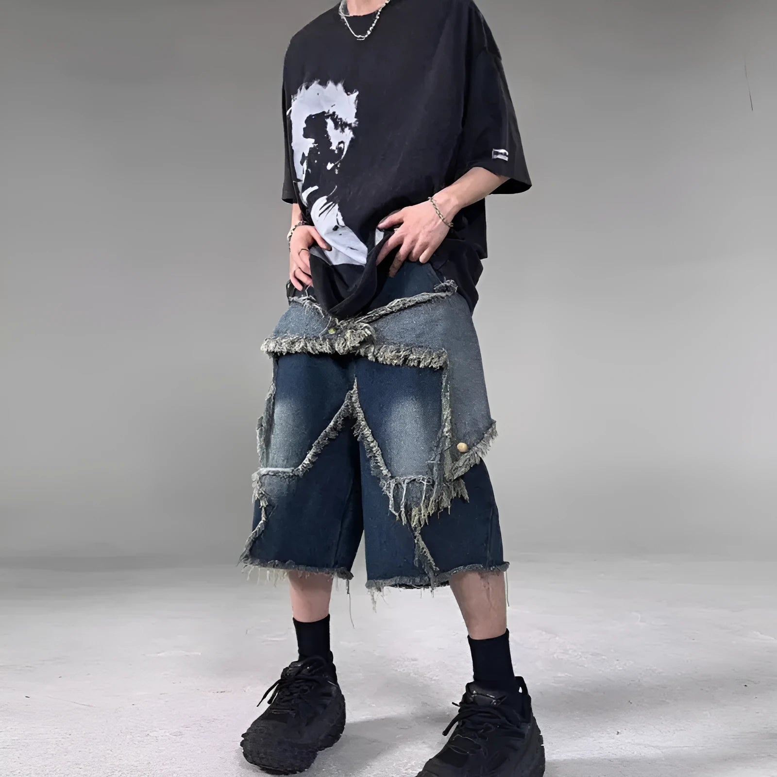 Men's blue denim shorts with five-pointed star embroidery and frayed hem in loose fit style