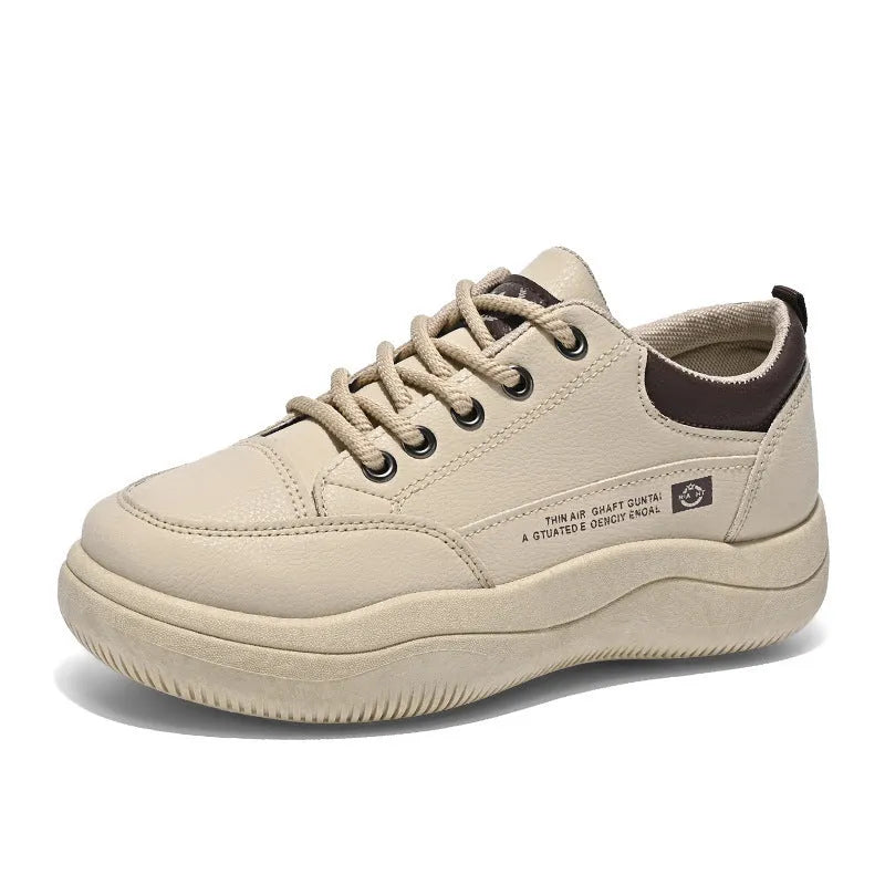 Women's white Korean-style low-top pumps with cross straps and lace-up front on a rubber sole.