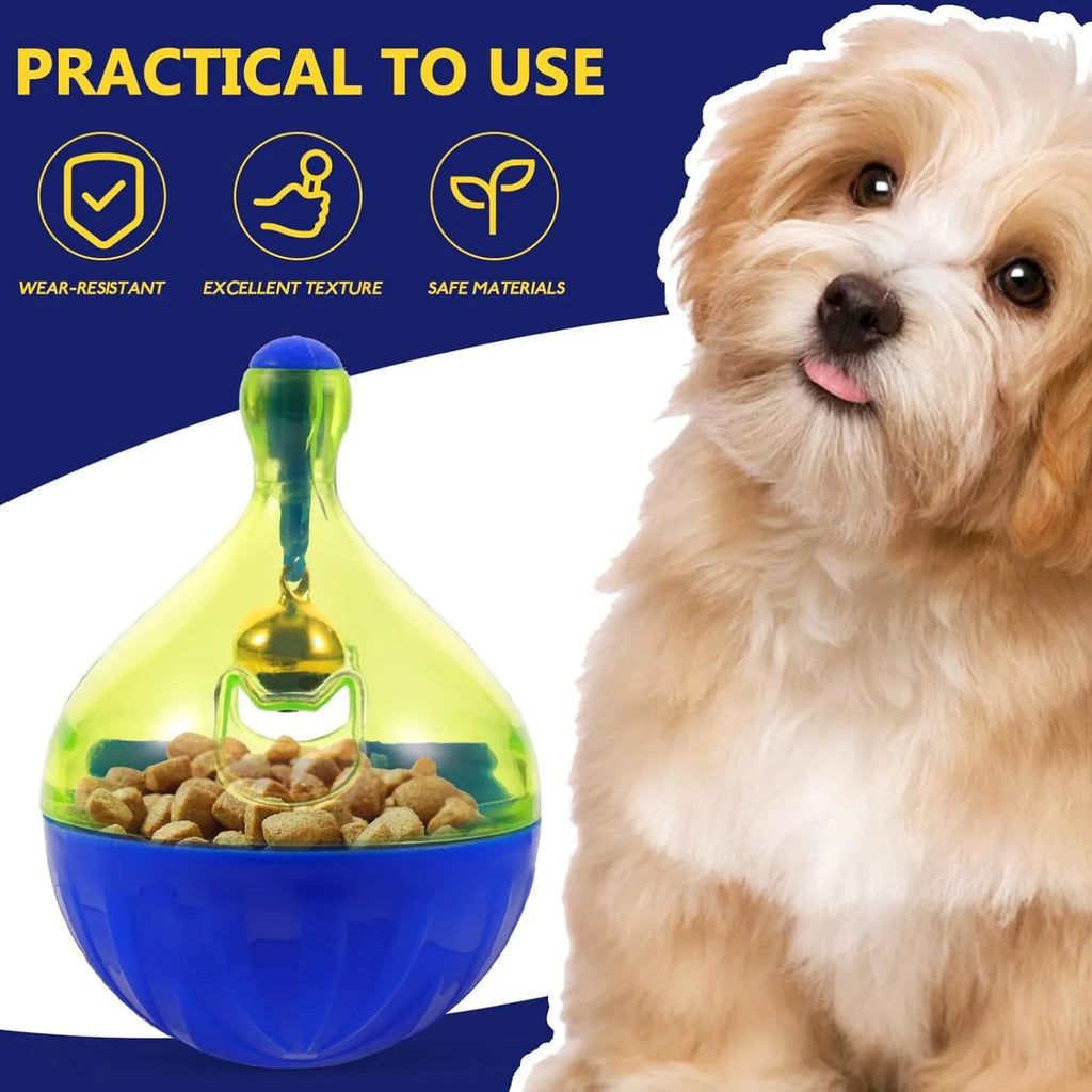 White tumbler-shaped dog and cat treat dispenser toy on a wooden floor
