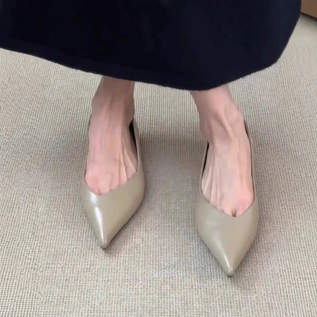 French minimalist pointed toe flat pumps with height increasing insole, solid colour, flanging details