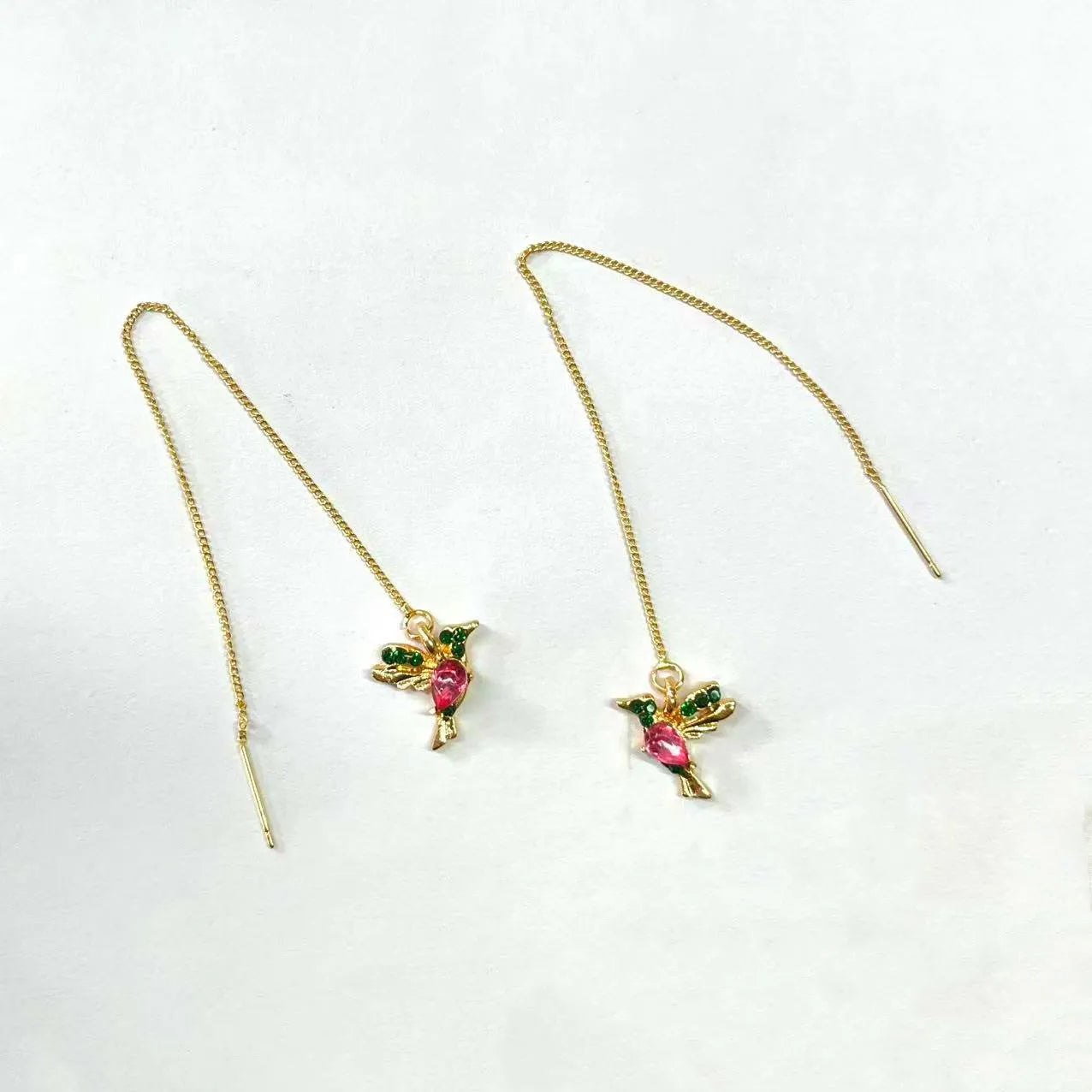 Long bird hanging earrings with mixed zirconium wings in blue, red, and red lvzuan colour options.