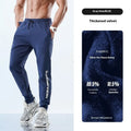 Men's black ankle-tied sweatpants with mid waist on a plain background
