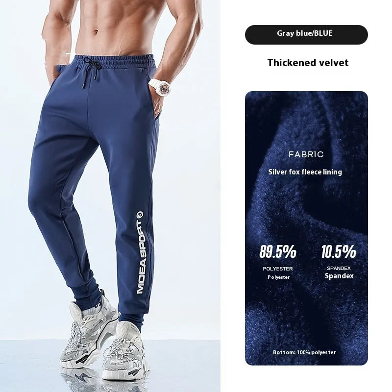 Men's black ankle-tied sweatpants with mid waist on a plain background