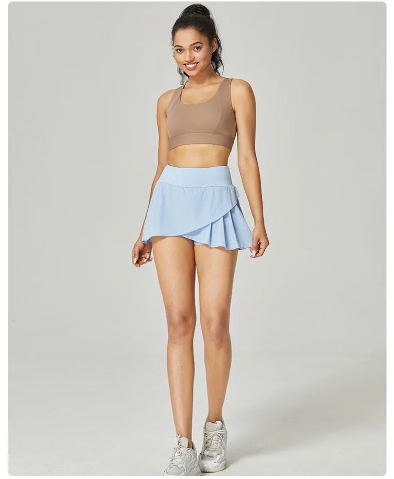 Women's solid colour quick-drying sports shorts in nylon with spandex lining for running and gym.