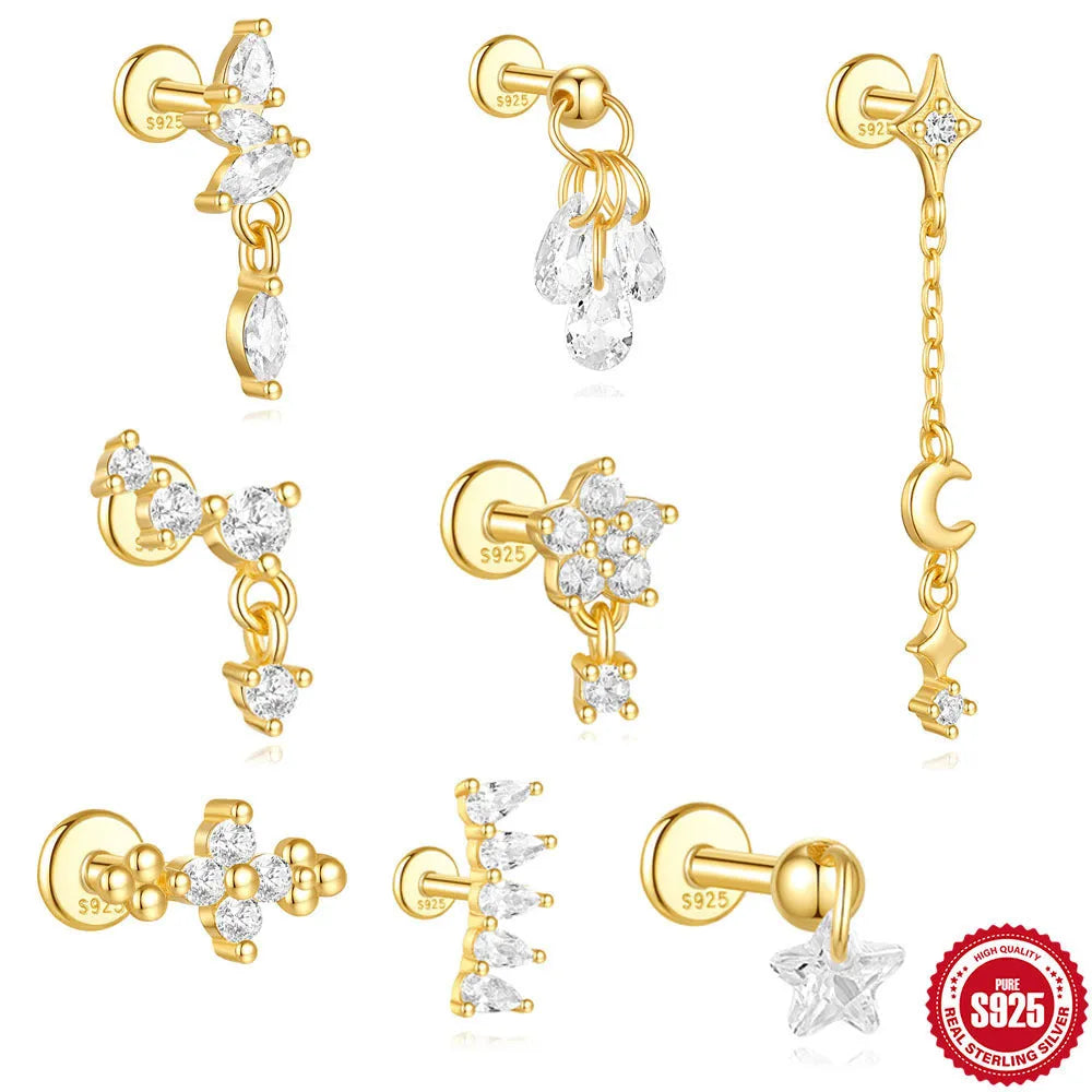 S925 sterling silver geometric earring with embedded moon, star, and diamond design on a gold-coloured background.