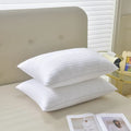 White cotton satin stripe pillow with feather cotton filling showing size options.