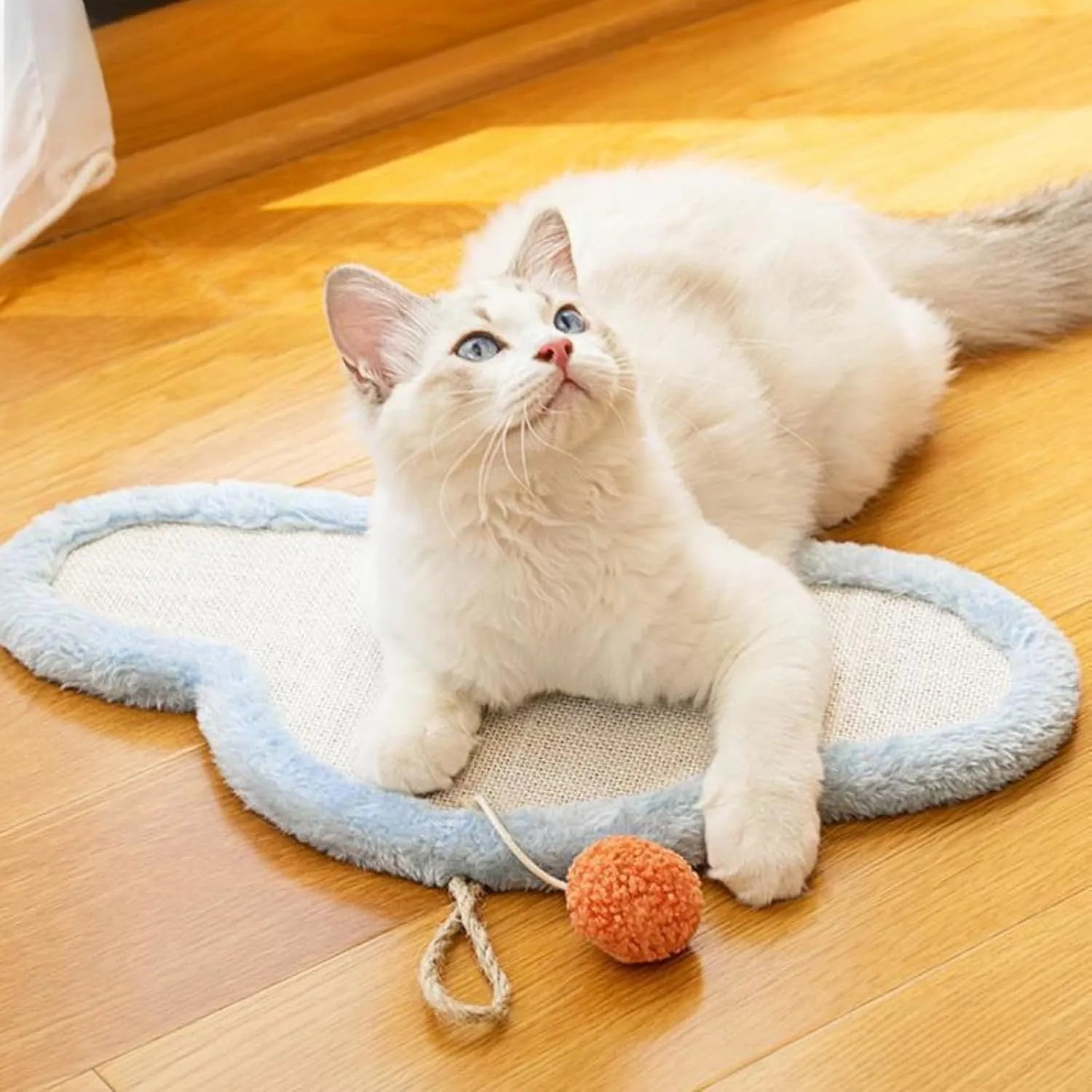 Natural sisal cat scratching mat with sleeping cat design, wall mounted