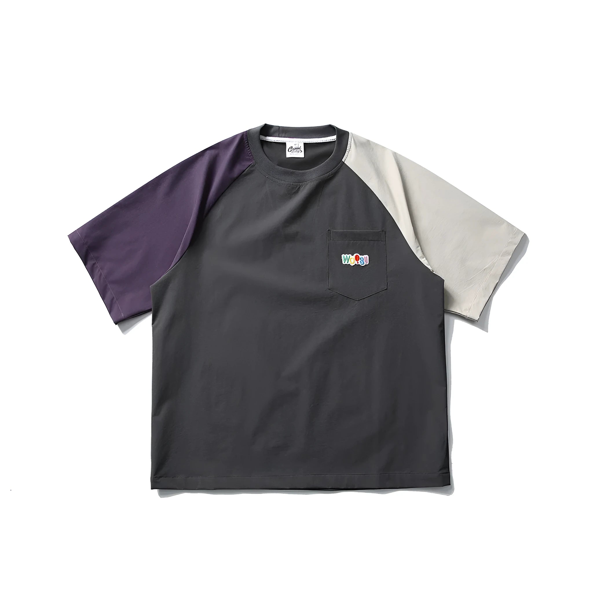 Dark grey men's loose fit t-shirt with contrasting colour raglan sleeves on a hanger.