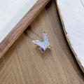 Copper insect fashion ring with an adjustable opening in one of three colour finishes.