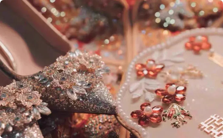 Champagne coloured women's wedding shoes with crystal rhinestones and a pointed toe, shown with a high heel.