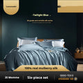 Solid colour silk four-piece quilt cover set shown in Champagne Gold on a bed