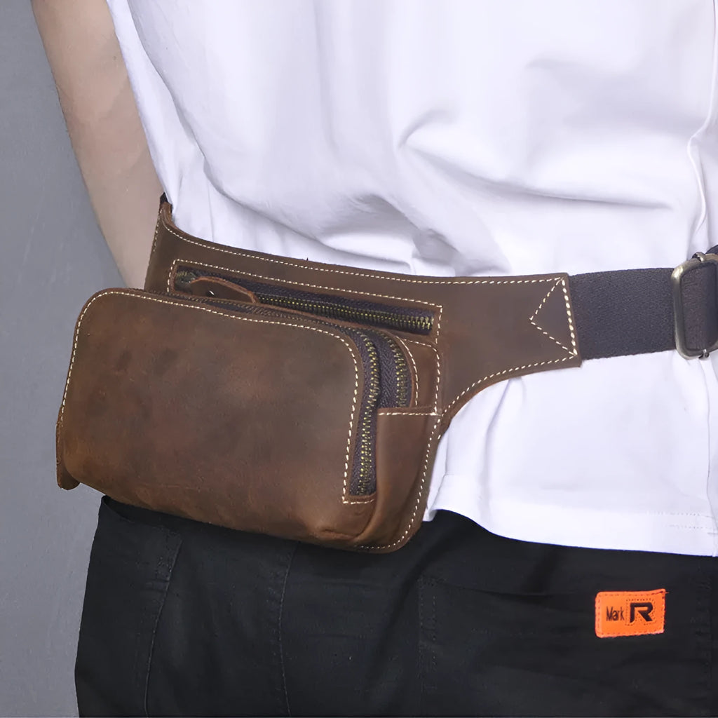 Brown cowhide leather men's waist bag with adjustable strap and zip closure