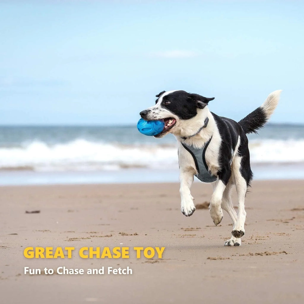 Natural rubber squeaky dog chew ball with textured surface grooves in blue, green, or orange colours