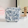 Polyester key storage bag with floral pattern and sewing thread detailing