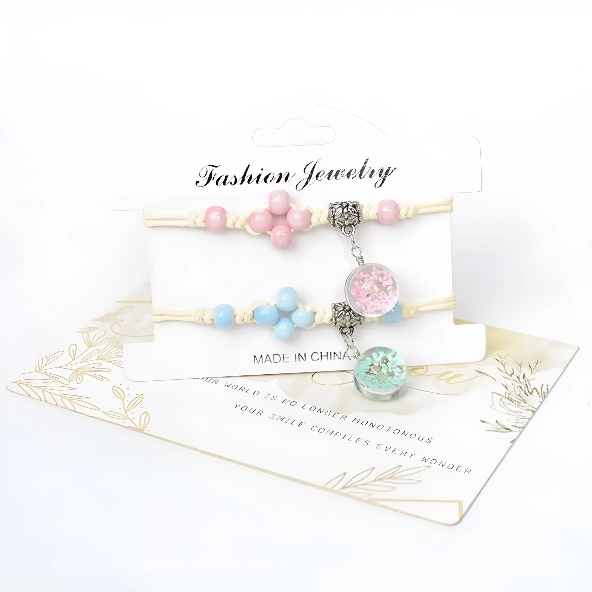 Glass dried flower bracelet with large 1.4cm beads containing real preserved flowers, in a hand-woven design.