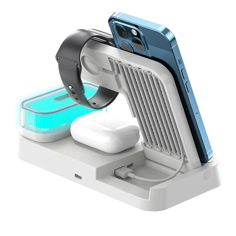 White 4-in-1 foldable wireless charging station showing phone on stand, Apple Watch dock, and glowing RGB night light.
