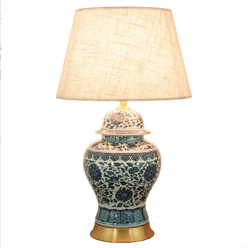 Blue and white porcelain Chinese table lamp with ceramic base and cloth shade