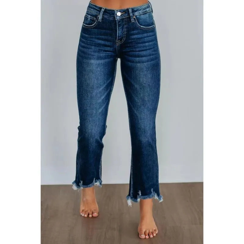 Casual women's denim trousers with hand-worn detailing in dark blue cotton fabric