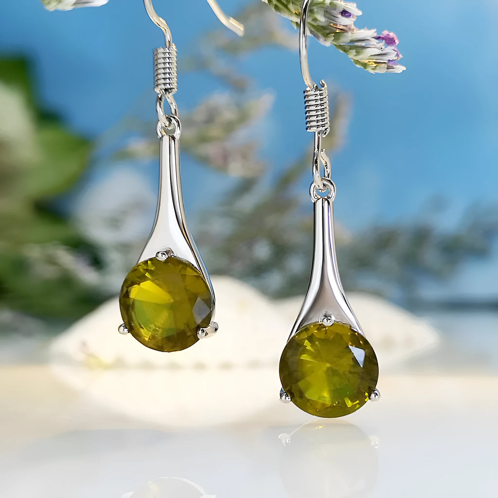 Olive green drop shape fashion earrings with a retro minimalist style.