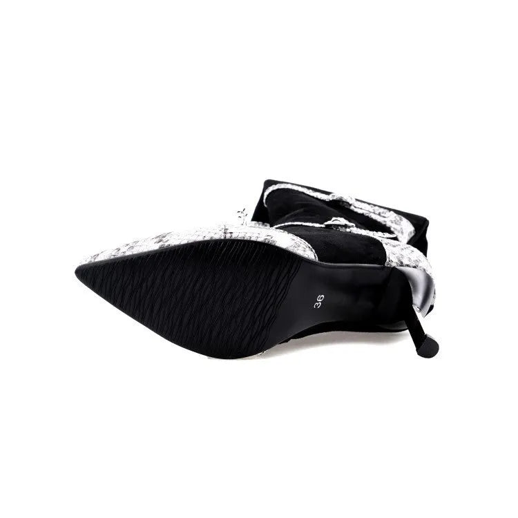 Black and grey women's knee high boots with a thin high heel on a rubber sole
