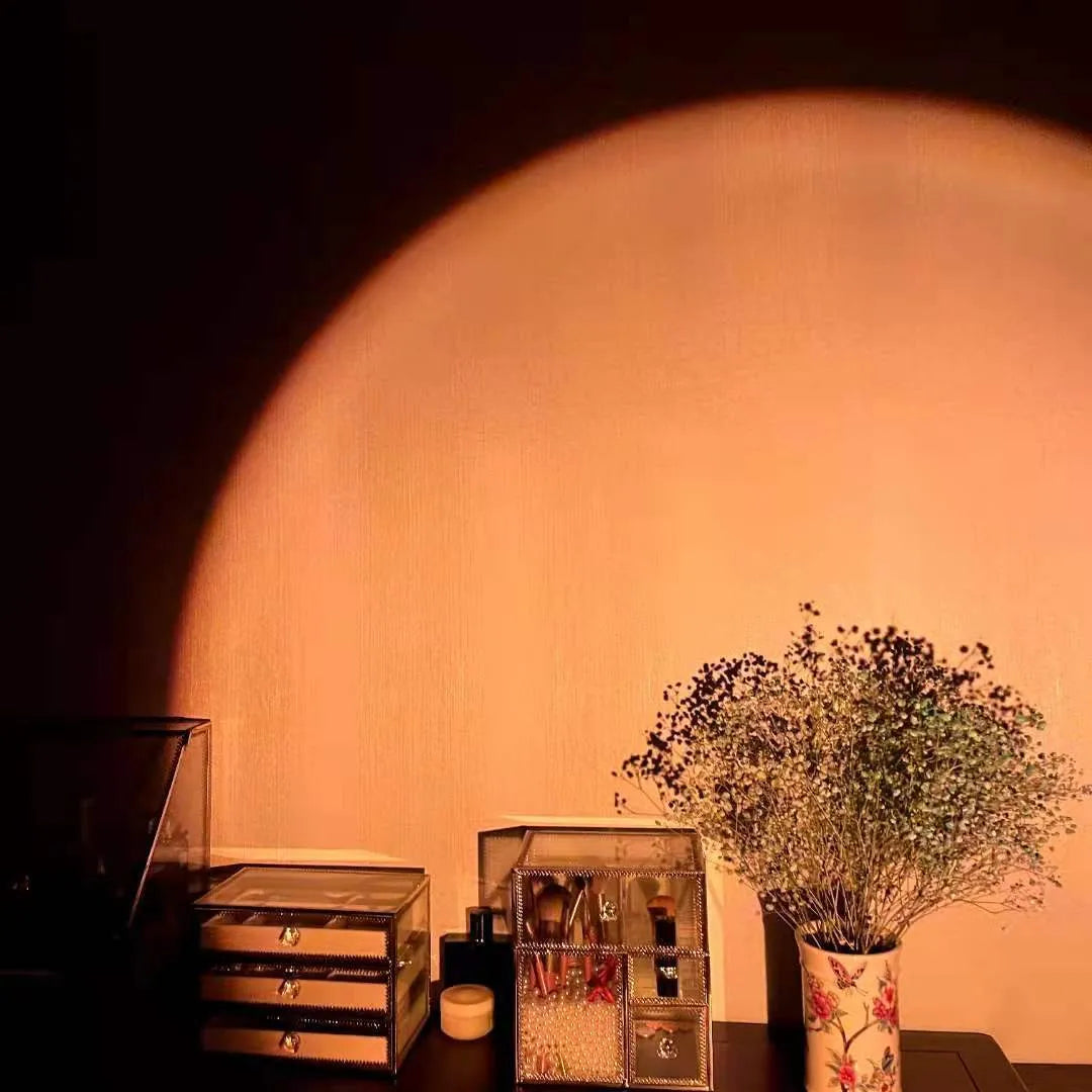 Rechargeable sunset lamp projecting rainbow colours with USB cable and push-button control