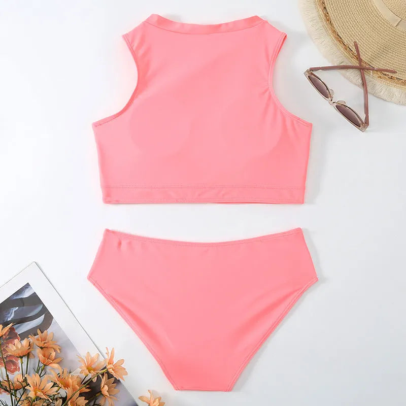 Pink high waist bikini set with split briefs design on a mannequin.