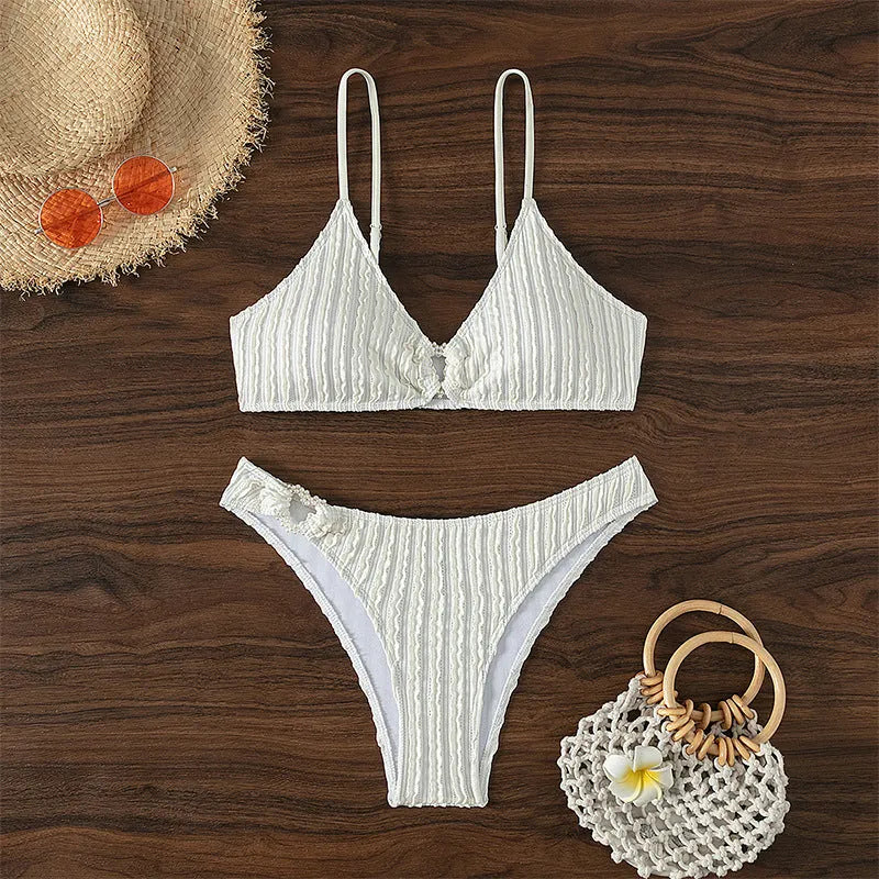 White women's V-neck swimsuit with split skirt design for swimming activities