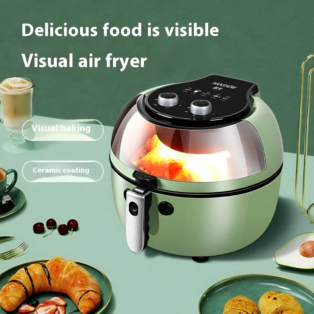 Air fryer oven with visible cooking window and mechanical button controls showing 8L capacity