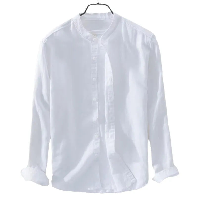Loose fit long sleeve linen shirt in solid colour on hanger showing casual collar and button front