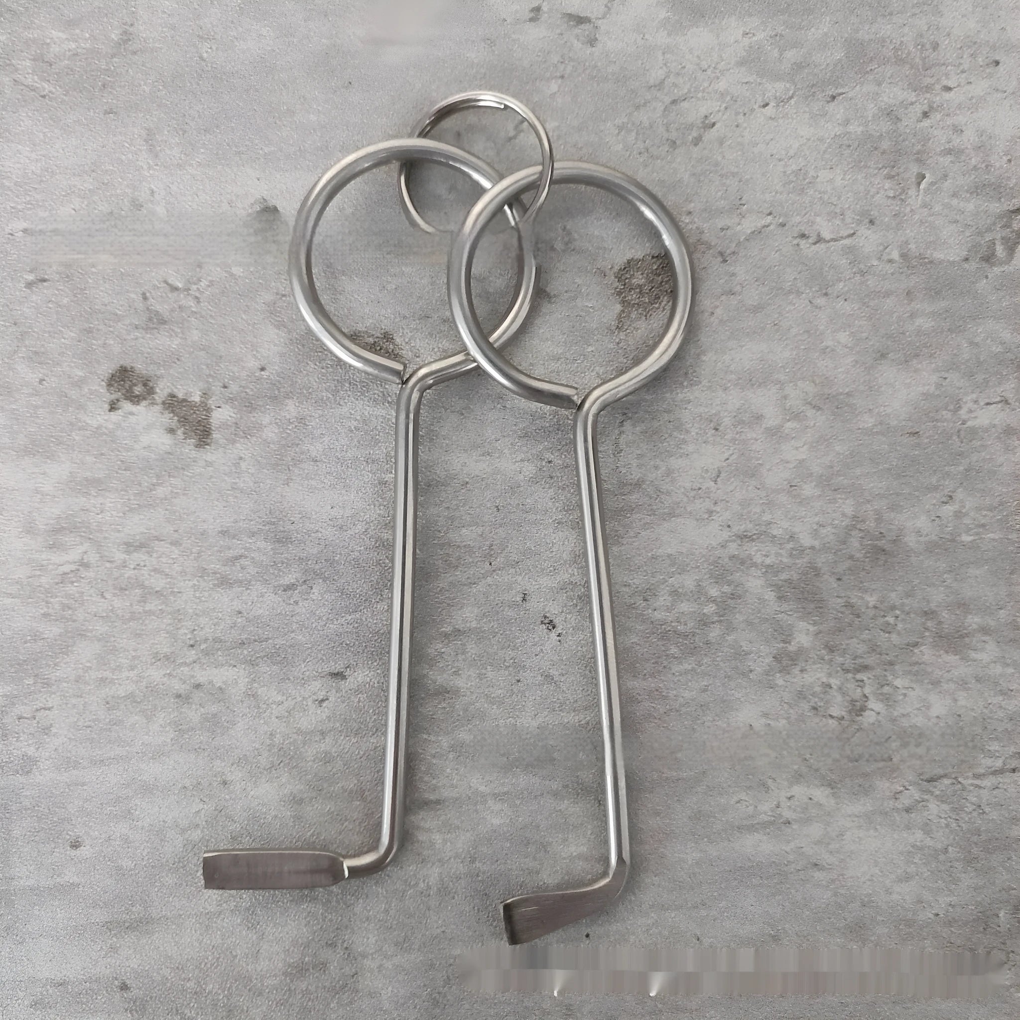 Two alloy wrench tools from portable universal maintenance set