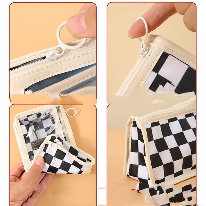 Transparent PVC pencil case with chessboard grid pattern showing pens inside