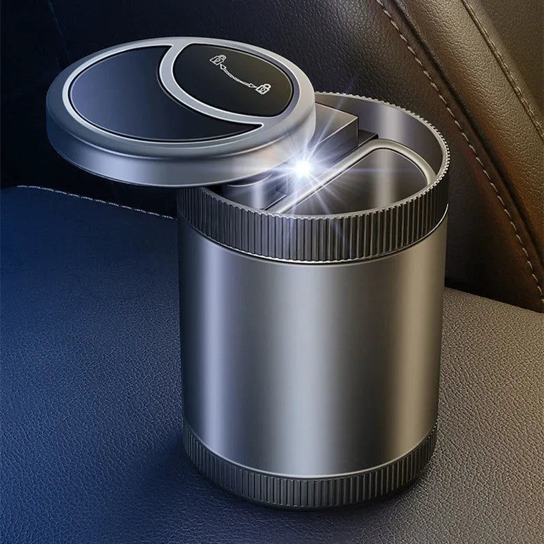 Automatic sensing vehicle ashtray in black, grey, red, or blue with USB cable.