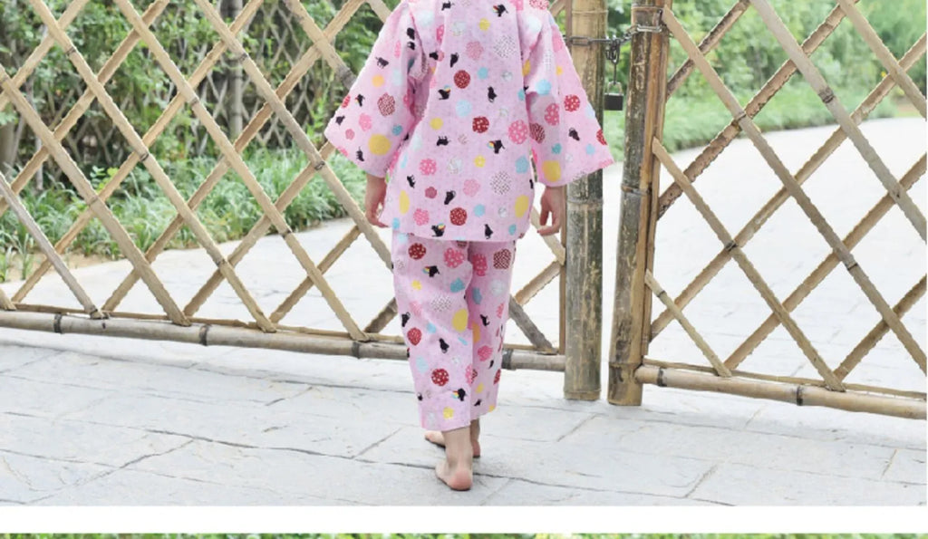 Pink cotton girls pajama set with long sleeves and floral ball cat cartoon print