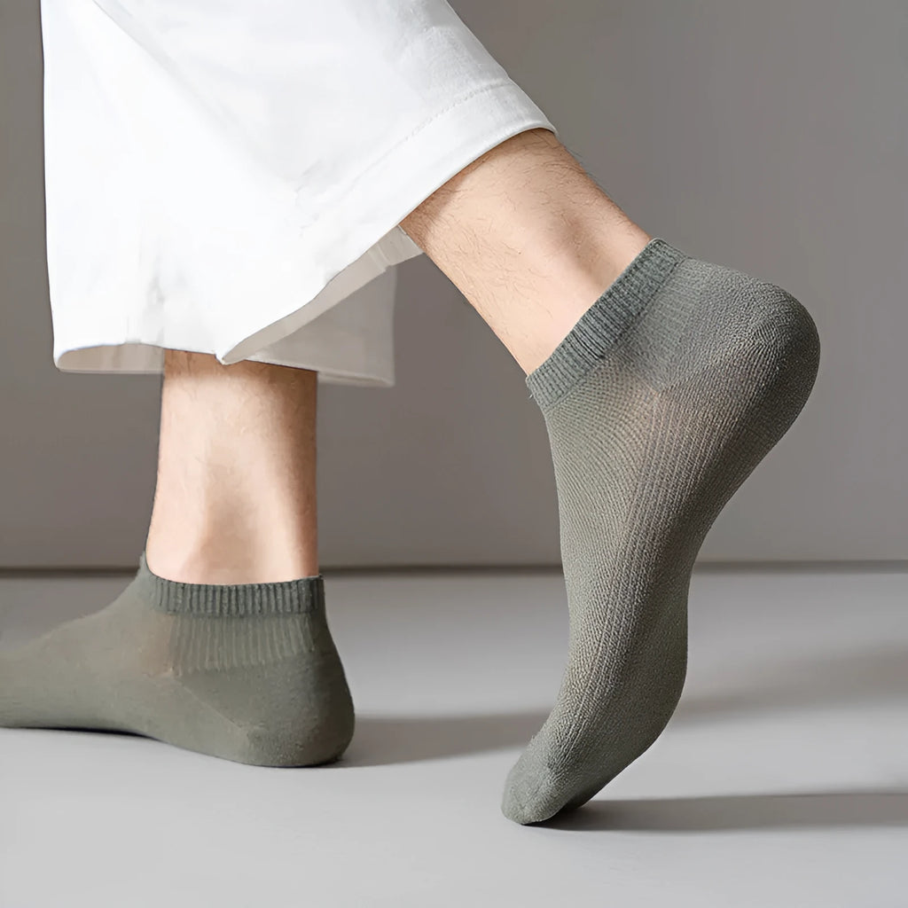 Solid colour low-cut polyester boat socks for men, shown in one of six available colours.
