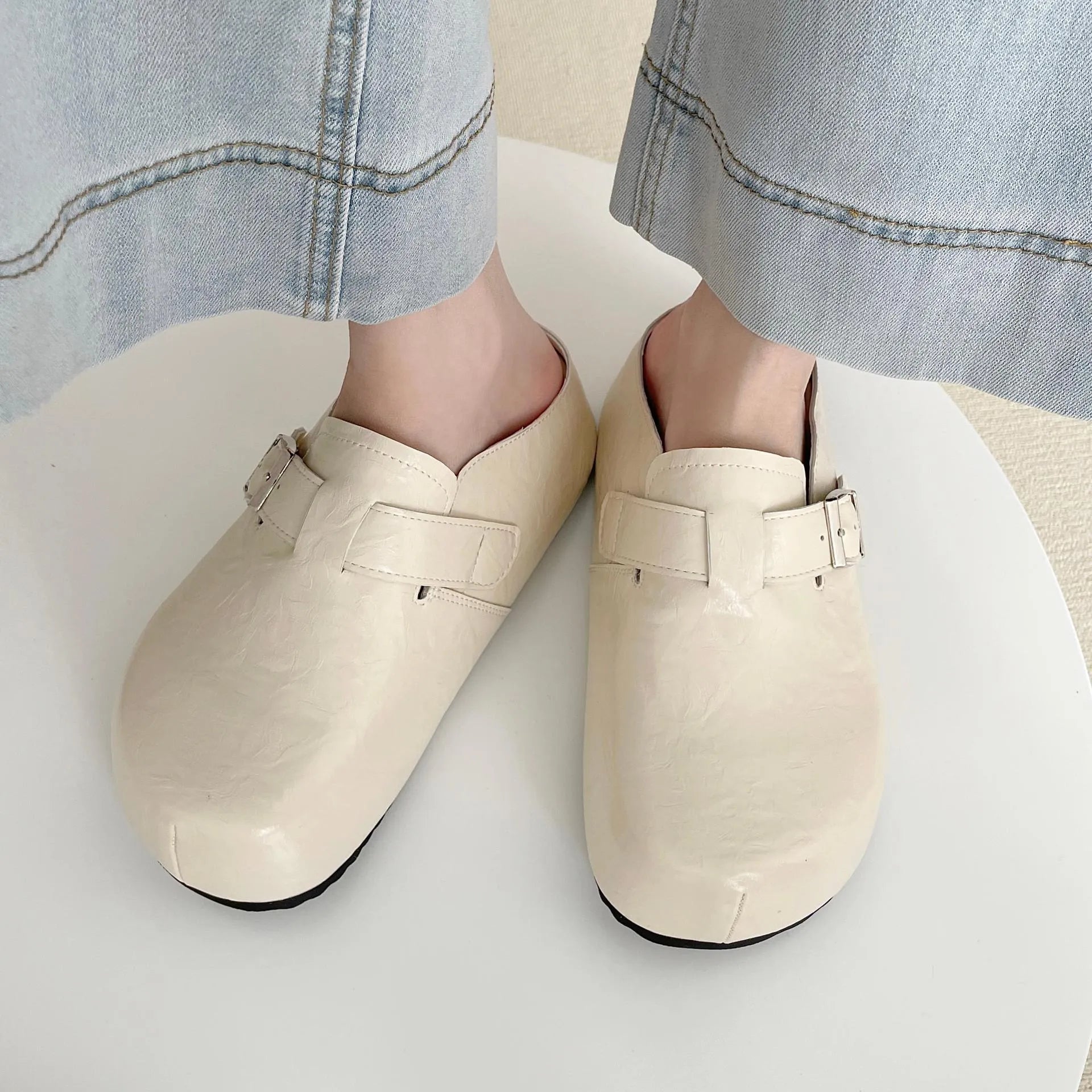 Flat buckle casual sneakers with round toe and PU leather upper in multiple colour options