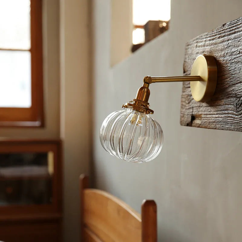 Pumpkin-shaped glass wall lamp with decorative design for living room or bedroom