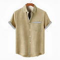 Loose fit linen short sleeve shirt with an ocean fish pattern print on the lapel.