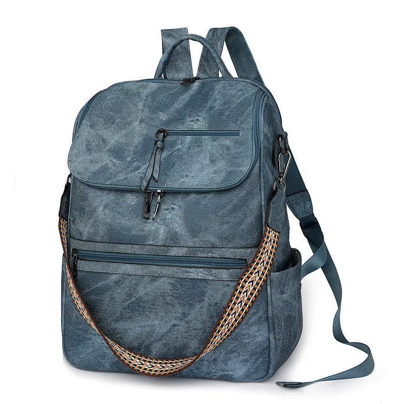 Retro college backpack with curved shoulder straps in six colour options including black, blue, and yellow apricot