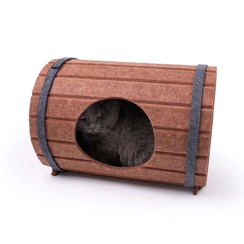 Assembled wine barrel pet bed for cats with soft interior, shown alongside its three flat felt panels and two binding straps.