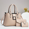 Three-piece textured PU women's crossbody bag set in square vertical shape showing internal compartments