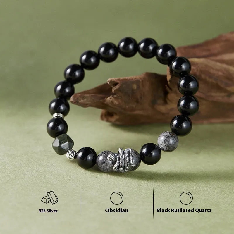 Men's S925 sterling silver bracelet with obsidian black hair crystal and detailed snake zodiac design on a black background.