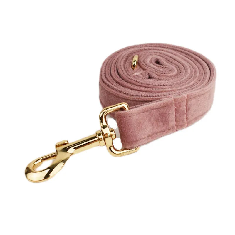Light purple cloth dog collar set with matching leash, decorative bow, and dog vest