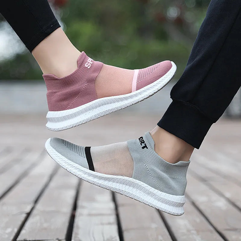 Flyknit low-top sock shoes in khaki with tassel laces and a breathable hollow design on an MD sole.