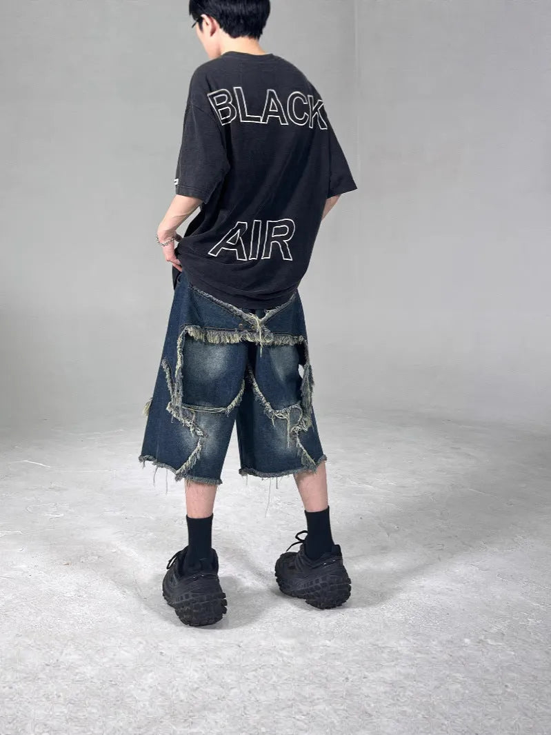 Men's blue denim shorts with five-pointed star embroidery and frayed hem in loose fit style