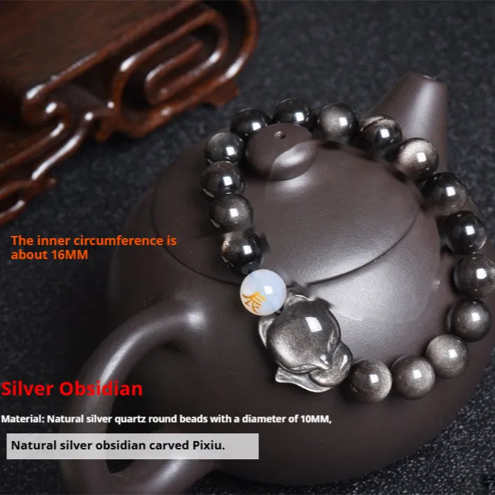 10mm obsidian zodiac bracelet on wrist showing adjustable cord closure and polished stone beads