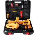 Yellow steel electric car jack and wrench set on a garage floor