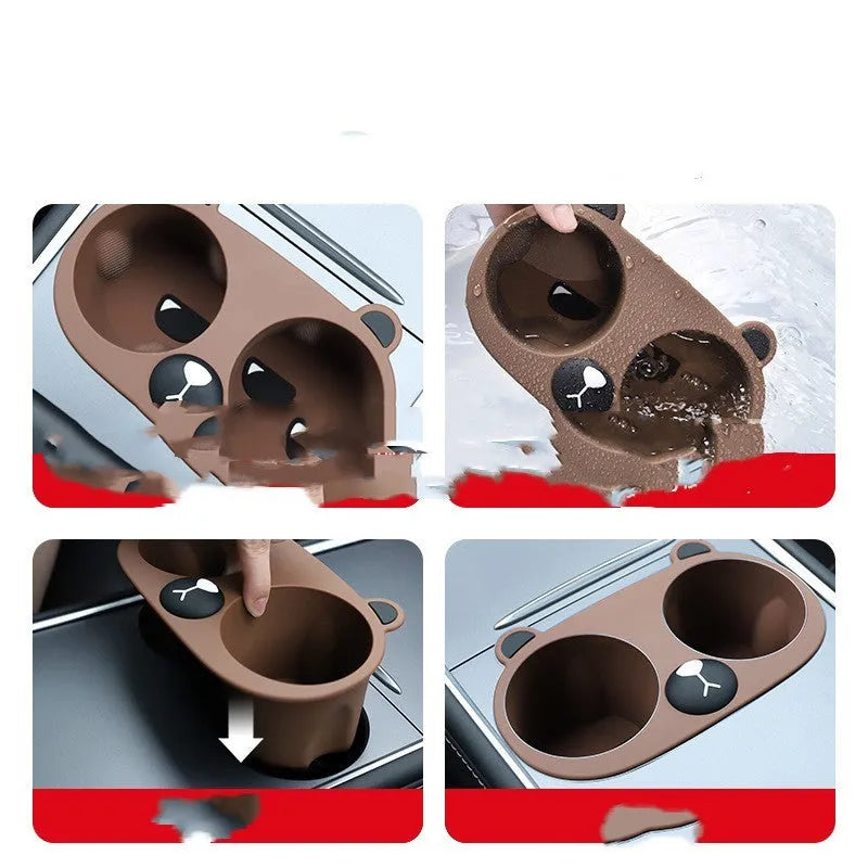 Grey silicone car centre console cup holder insert stabilising a drink