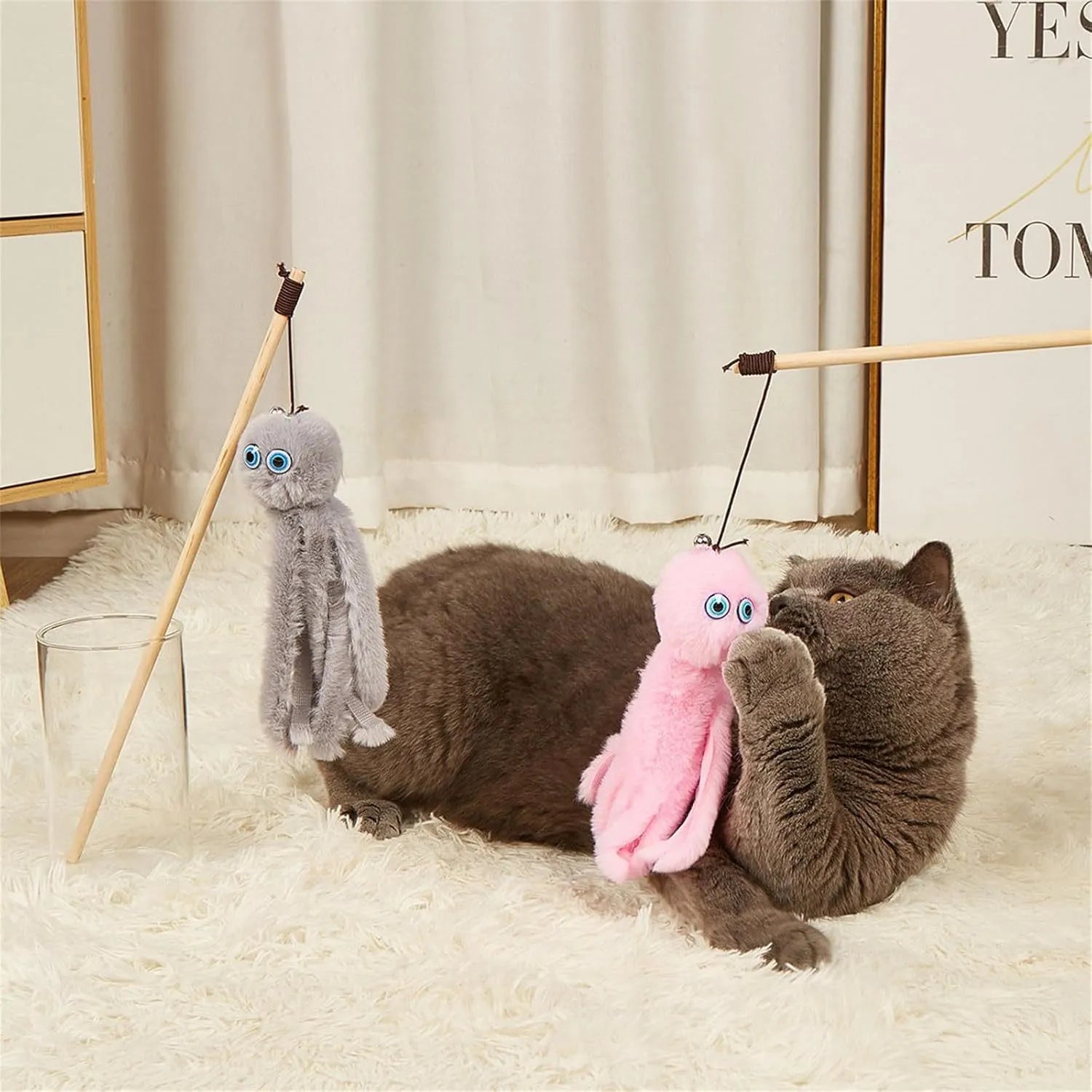 Octopus-themed furry cat toy with realistic eyes on 40cm flexible stick in pink colour