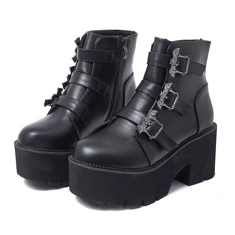 Black women's punk bat buckle gothic short boots with side zip and thick heel.